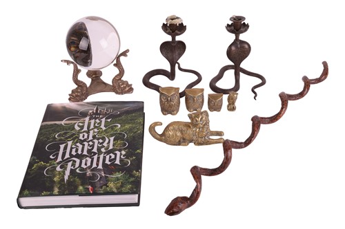 Lot 264 - A crystal ball on brass stand, 23 cm high,...