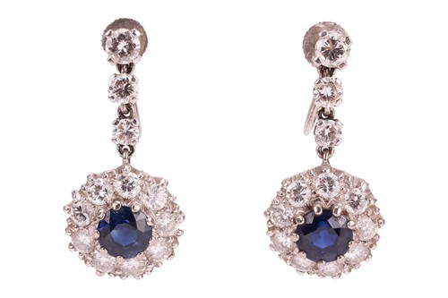 Lot A pair of sapphire and diamond cluster drop...