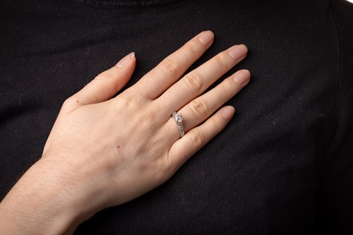 Lot A diamond solitaire ring in 18ct white gold,...