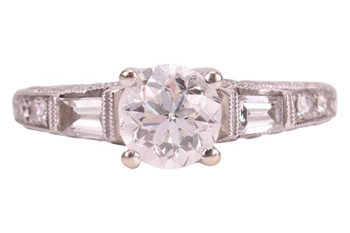 Lot A diamond solitaire ring in 18ct white gold,...