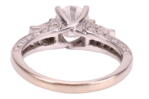 Lot A diamond solitaire ring in 18ct white gold,...