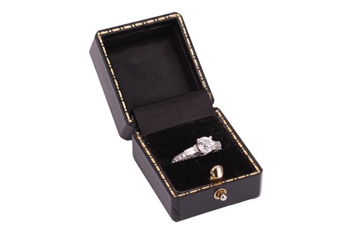 Lot A diamond solitaire ring in 18ct white gold,...