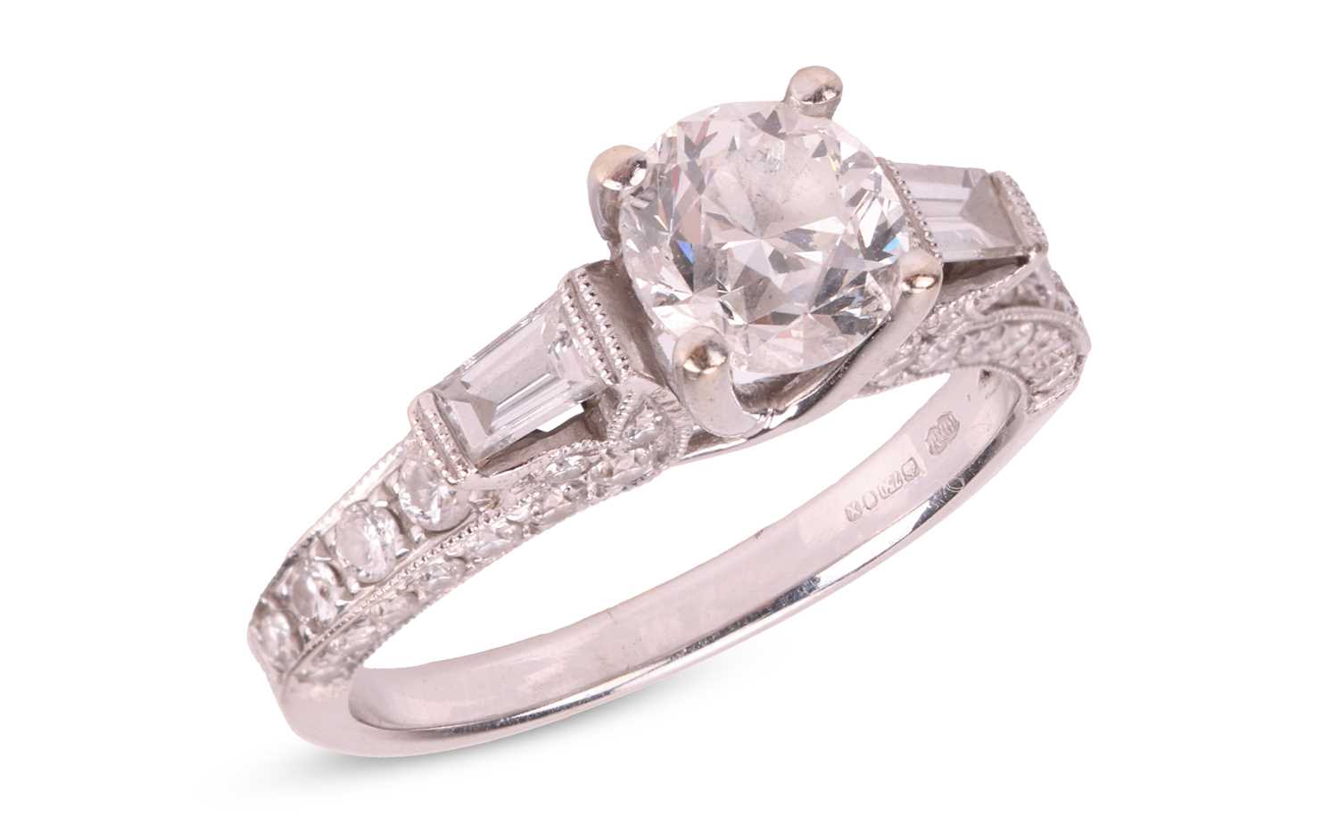 Lot A diamond solitaire ring in 18ct white gold,...