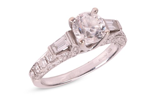 Lot A diamond solitaire ring in 18ct white gold,...