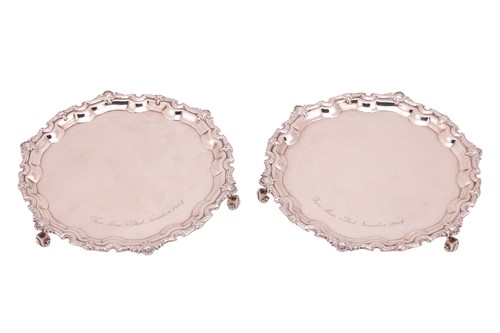 Lot 358 - A pair of silver salvers, circular with...
