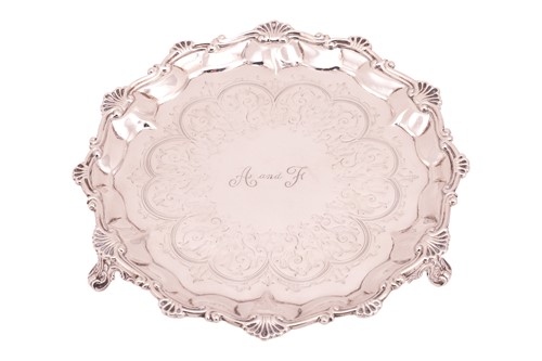 Lot 395 - A Victorian silver salver, with shaped scroll...