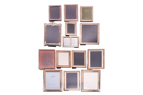 Lot 391 - A quantity of silver-mounted photograph frames,...