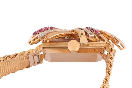 Lot Omega - A ruby and diamond-set concealed...