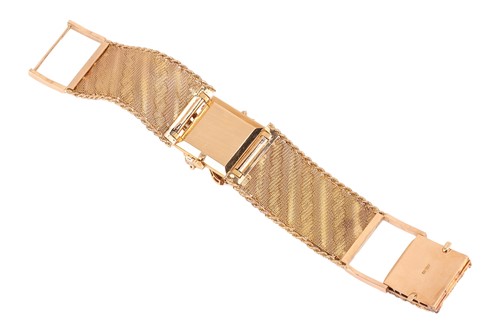 Lot Omega - A ruby and diamond-set concealed...