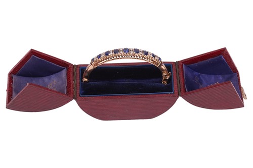 Lot A Victorian sapphire and diamond hinged bangle,...