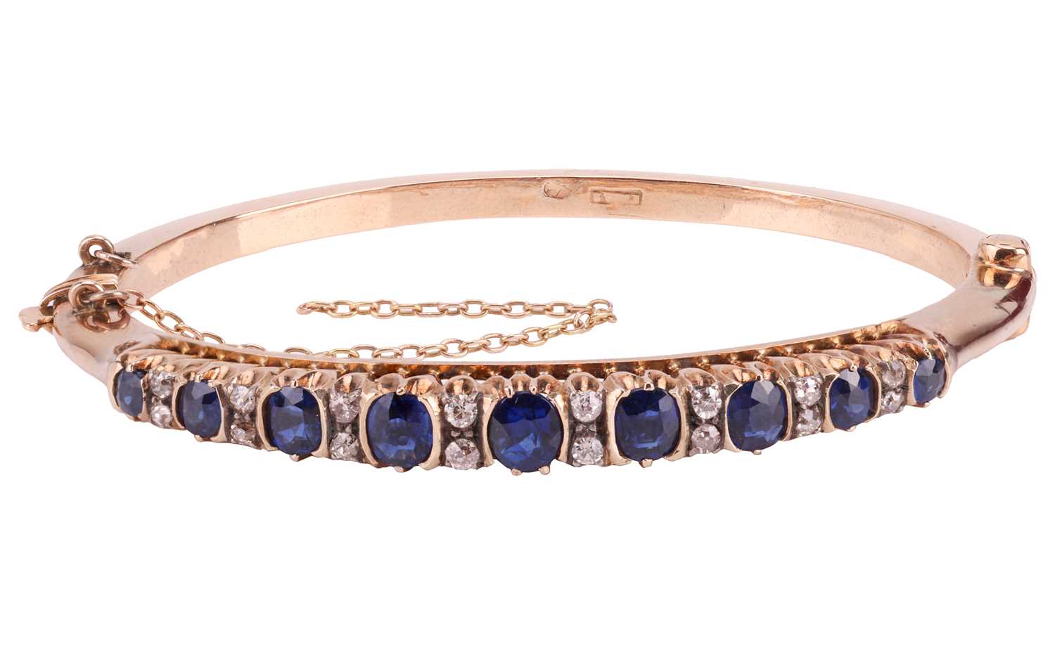 Lot A Victorian sapphire and diamond hinged bangle,...