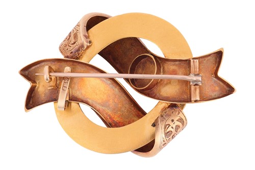 Lot 7 - A Victorian enamel and pearl ribbon brooch,...