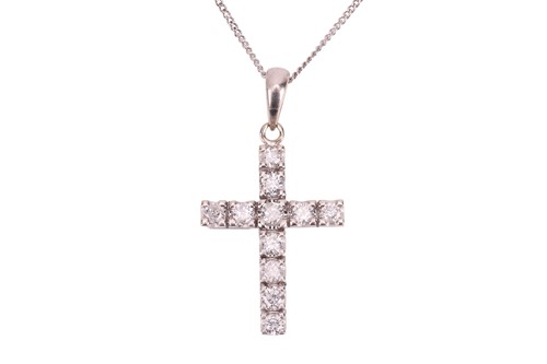 Lot 148 - A diamond-set cross pendant, claw-set with...