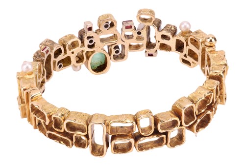 Lot A Modernist multi-gem bangle, designed by Karl...