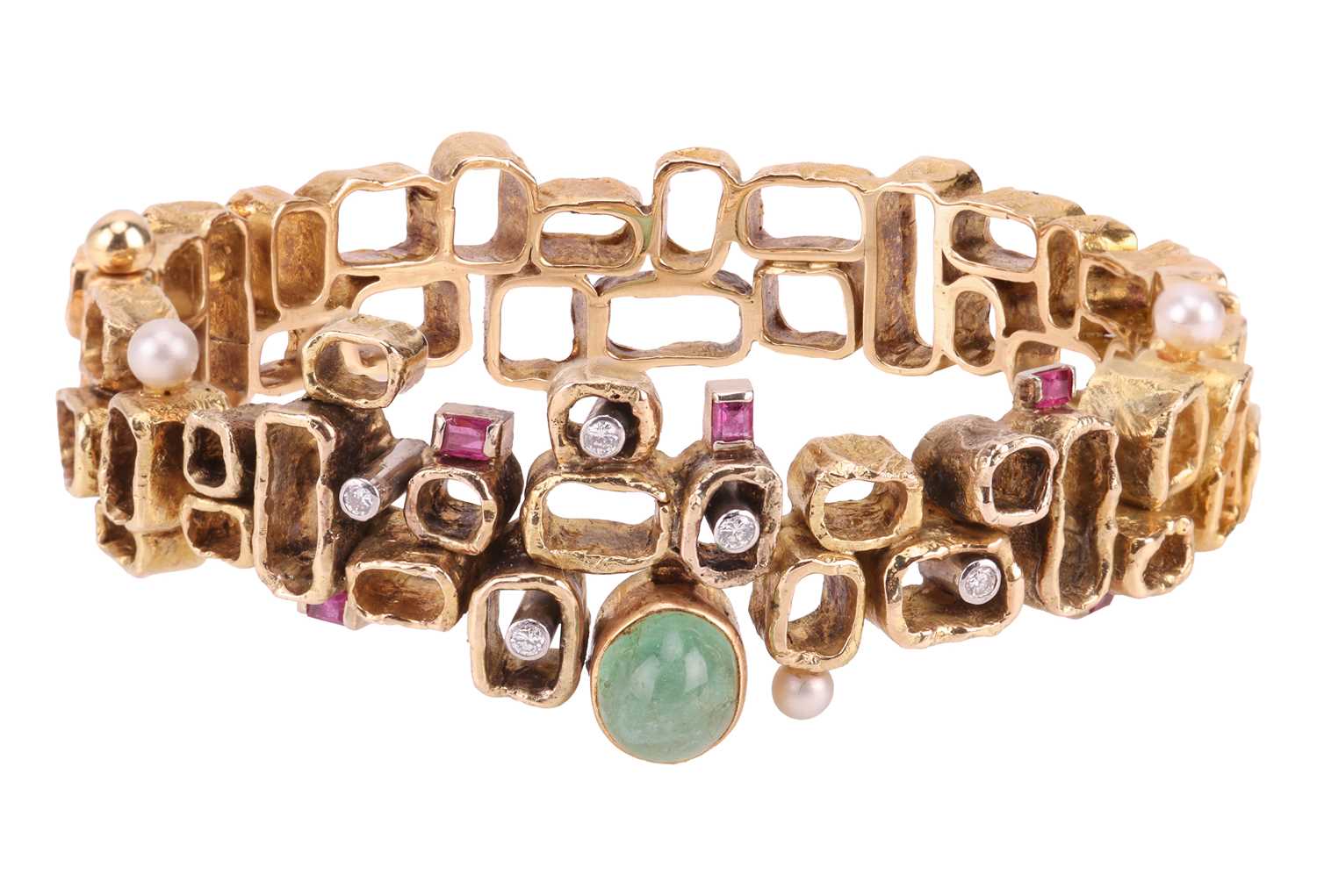 Lot A Modernist multi-gem bangle, designed by Karl...
