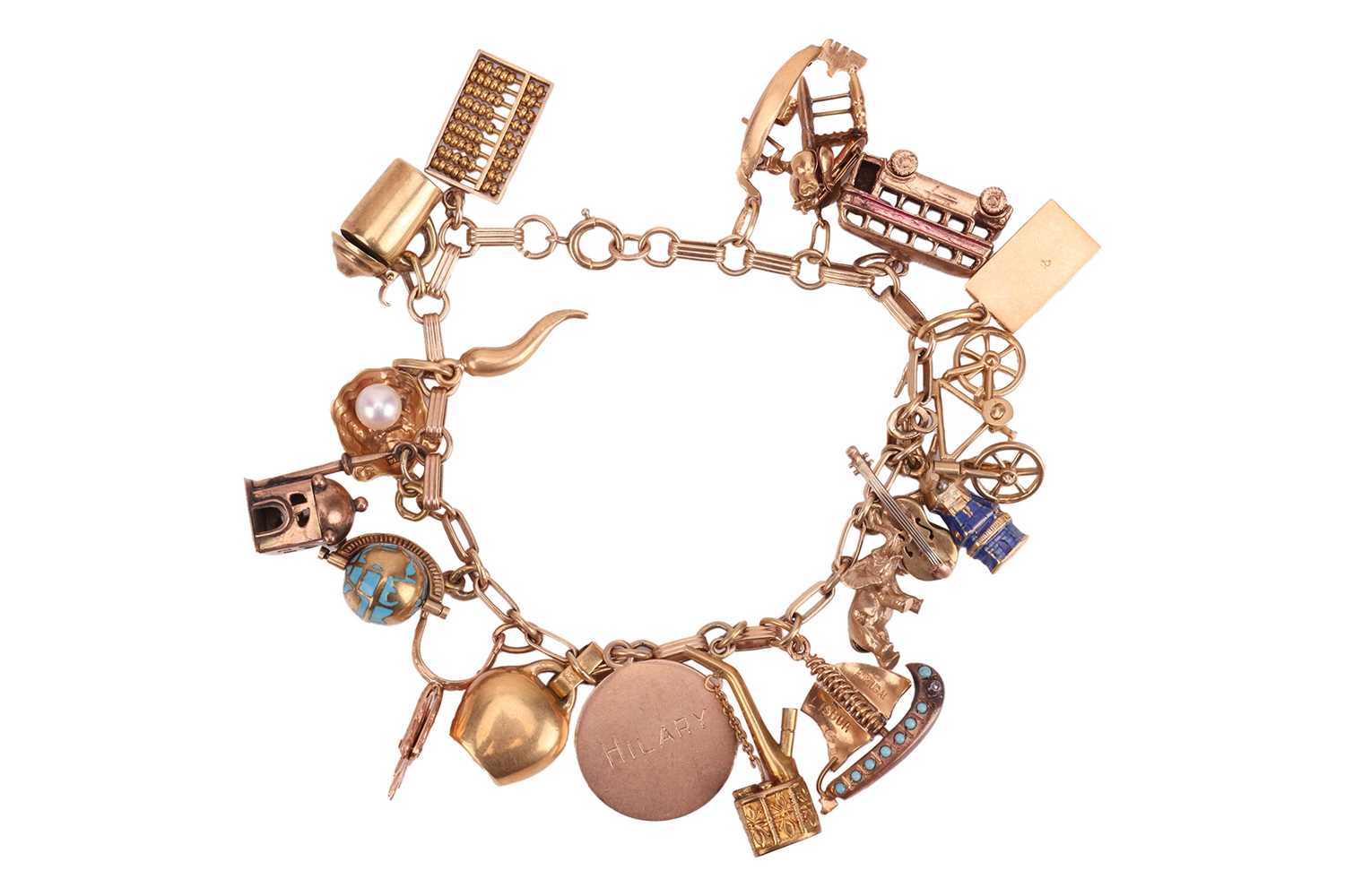 Lot 111 - A charm bracelet, the fancy bar and link...