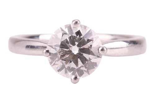 Lot A diamond solitaire ring in platinum, claw-set...