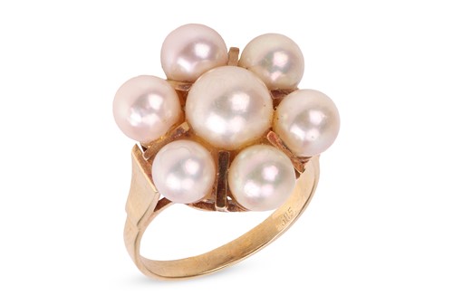 Lot 26 - A pearl-set cluster ring, of stylised floral...