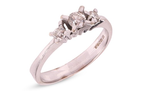 Lot 158 - A diamond-set half-hoop ring in 14ct white...