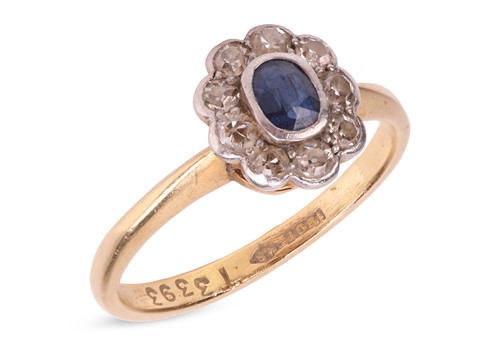 Lot A sapphire and diamond cluster ring,...