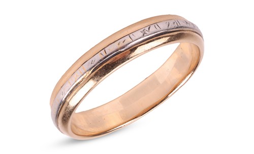 Lot 57 - A two-toned wedding band, the D-profile band...