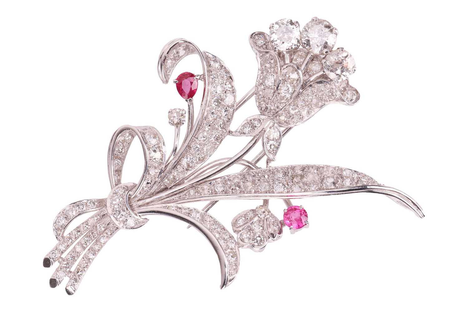 Lot A floral spray brooch set with diamond and...