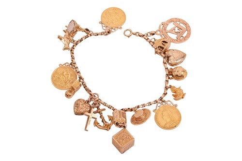 Lot 84 - A charm bracelet, comprising a series of cable...