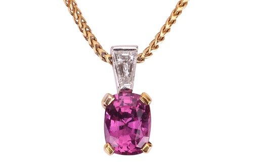 Lot 144 - A pink sapphire and diamond pendant on chain,...