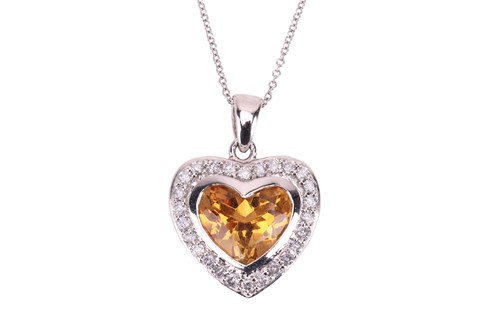 Lot 86 - A heart citrine and diamond cluster pendant on...