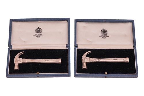 Lot 122 - A pair of Asprey & Co cast silver miniature...
