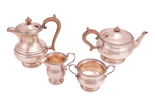 Lot 389 - A 20th-century silver four-piece tea set,...