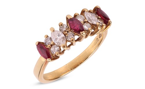Lot A ruby and diamond half-hoop ring in 18ct gold,...