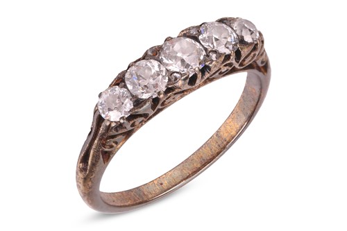 Lot 39 - An old-cut diamond half-hoop ring, with an...