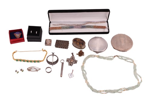 Lot 39 - A silver compact, another in Art Deco taste, a...