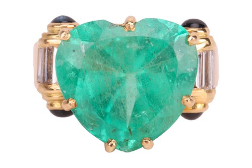 Lot 204 - A large heart-shaped emerald dress ring, the...