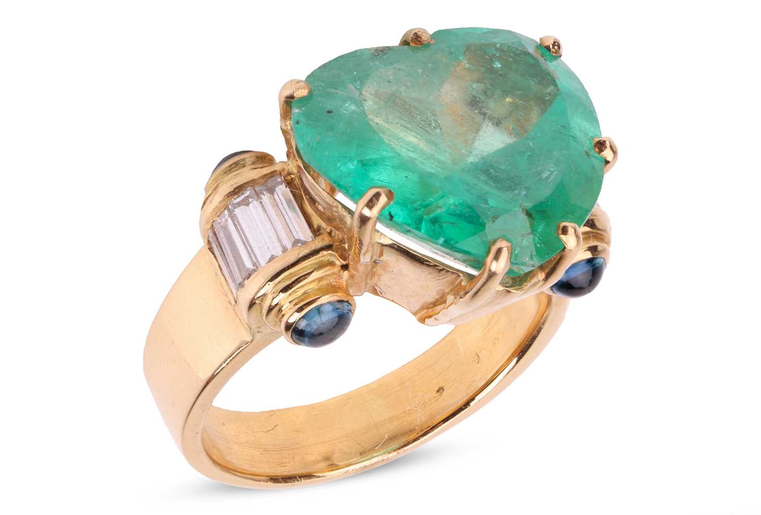 Lot 204 - A large heart-shaped emerald dress ring, the...