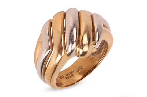 Lot A two-tone dress ring in 18ct gold, of...