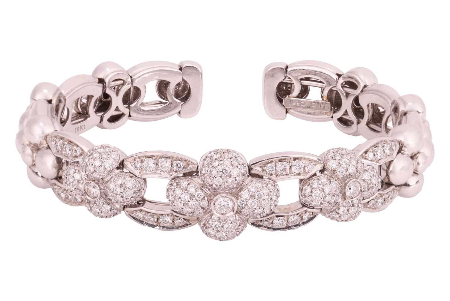 Lot 302 - David Morris - a diamond-set flexible torque...