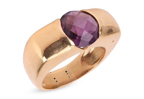 Lot An amethyst dress ring, comprises a round rose...