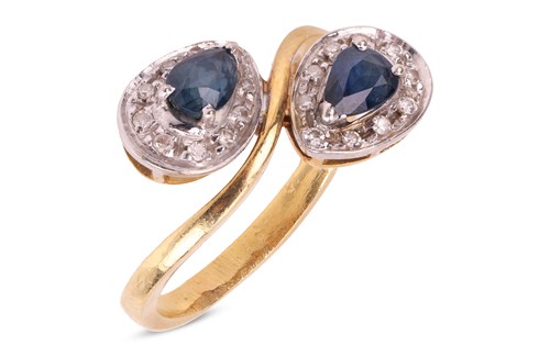 Lot A sapphire and diamond crossover ring,...