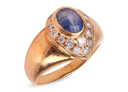 Lot 200 - A sapphire and diamond dress ring, the...