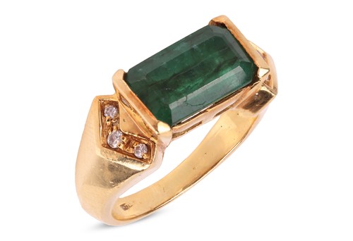 Lot An emerald and diamond ring, comprises a deep...