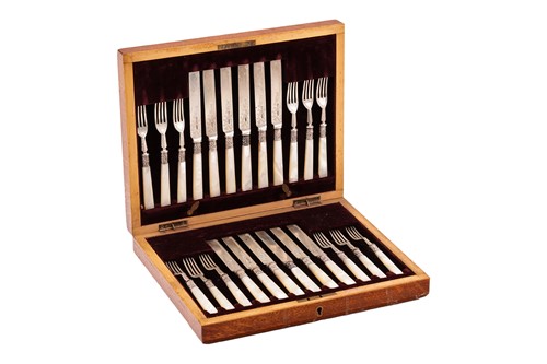 Lot 364 - An Edwardian cased set of silver and mother-of-...