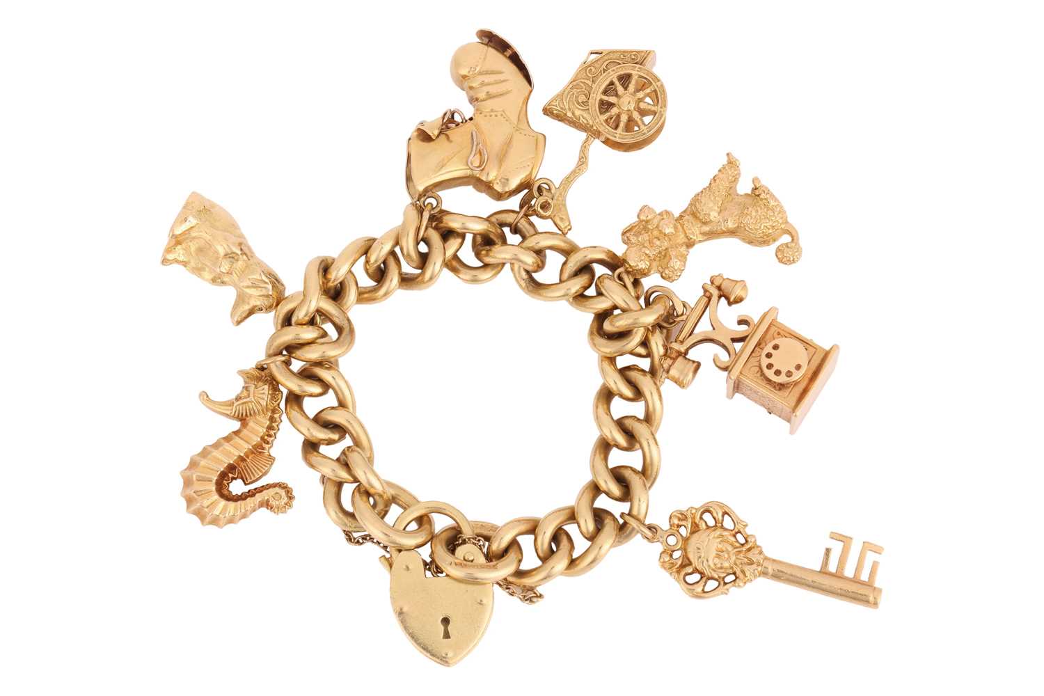 Lot 207 - A charm bracelet, comprising a heavy curb link...
