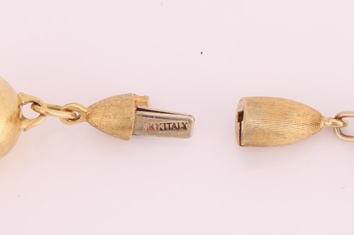 Lot 254 - A long fancy link necklace, comprising a...