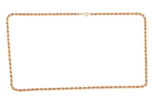 Lot 22 - A long twisted rope link necklace, completed...