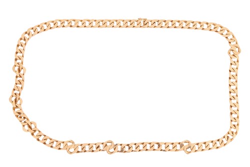 Lot 8 - A long flat curb link necklace, fastens with a...