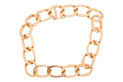Lot 80 - A curb link bracelet, completed with a...