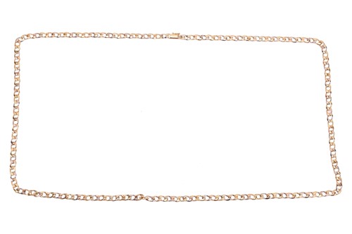 Lot 35 - A long tri-coloured curb link necklace,...