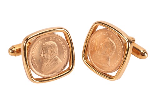 Lot 59 - A pair of cufflinks inset with 1/10oz...
